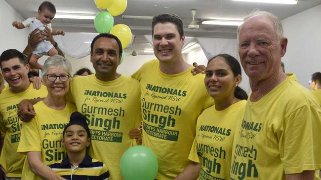 Nationals candidate Gurmesh Singh celebrates the campaign with retiring Member for Coffs Harbour Andrew Fraser and his supporters on election night. . Picture: Matt Deans