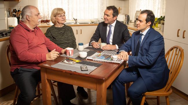 Domenic and Lynette Deguglielmo discuss changes to land tax with the Premier Steven Marshall and Liberal MP Vincent Tarzia, in a staged photo to spruik the reforms. Picture: Brad Fleet