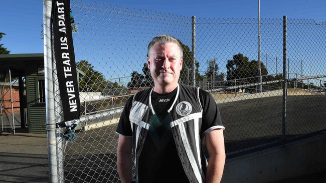 Port Adelaide supporter Justin Leckie at Alberton Oval after the iconic N L Williams scoreboard was demolished. Leckie lobbied the council to ensure the scoreboard was retained. Picture: Mark Brake