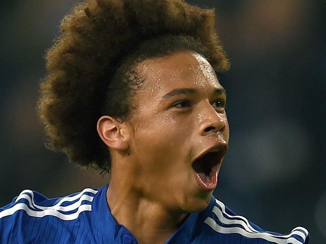 Schalke's midfielder Leroy Sane celebrates scoring during the German first division Bundesliga football match FC Schalke 04 v Eintracht Frankfurt in Gelsenkirchen, on September 23, 2015. AFP PHOTO / PATRIK STOLLARZ RESTRICTIONS: DURING MATCH TIME: DFL RULES TO LIMIT THE ONLINE USAGE TO 15 PICTURES PER MATCH AND FORBID IMAGE SEQUENCES TO SIMULATE VIDEO. ==RESTRICTED TO EDITORIAL USE == FOR FURTHER QUERIES PLEASE CONTACT THE DFL DIRECTLY AT + 49 69 650050.