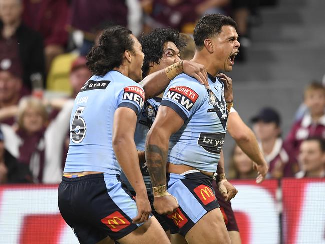 Latrell Mitchell was at his brilliant best in the Origin opener in Townsville. Picture: Ian Hitchcock/Getty Images.