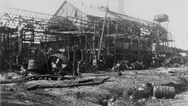 Millaquin Distillery destroyed by fire, Bundaberg, 1936. A devastating blaze that left significant damage to this iconic distillery. Source: John Oxley Library, State Library of Queensland