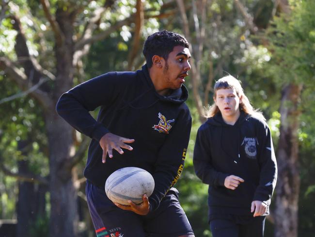 Newcastle Knights players including Lyndon Walker played footy with the kids involved in the program. Picture: Michael Gorton