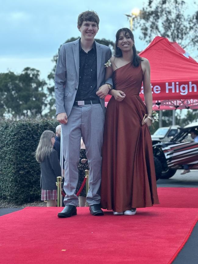 Students from Urangan State High School arrive at their formal.