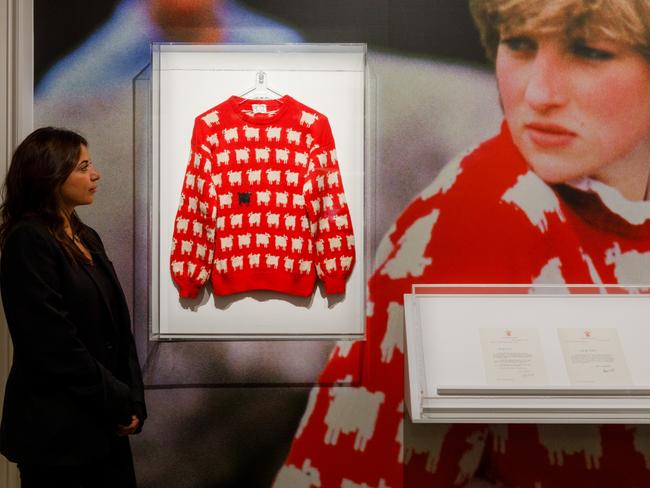 Princess Diana's historic black sheep jumper goes on view alongside Buckingham Palace letters at Sotheby's in London, England. The items will be part of an inaugural Fashion Icons sale at Sotheby's in New York in September. Picture: Tristan Fewings / Getty Images for Sotheby's