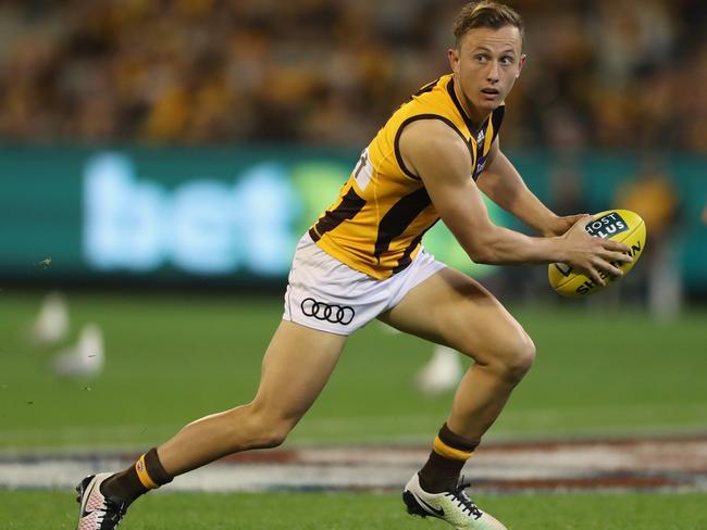 MELBOURNE, AUSTRALIA - MAY 06:  Billy Hartung of the Hawks runs with the ball during the round seven AFL match between the Richmond Tigers and the Hawthorn Hawks at Melbourne Cricket Ground on May 6, 2016 in Melbourne, Australia.  (Photo by Robert Cianflone/Getty Images)