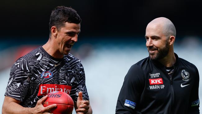 MELBOURNE, AUSTRALIA - APRIL 20: Scott Pendlebury and Steele Sidebottom of the Magpies are seen before the 2024 AFL Round 06 match between the Collingwood Magpies and the Port Adelaide Power at the Melbourne Cricket Ground on April 20, 2024 in Melbourne, Australia. (Photo by Dylan Burns/AFL Photos via Getty Images)