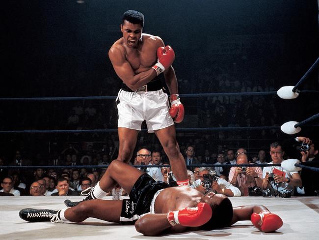 UNITED STATES - MAY 25:  Boxing: World Heavyweight Title: Muhammad Ali in action after first round knockout of Sonny Liston at St. Dominic's Arena. Cover.  Lewiston, ME 5/25/1965 CREDIT: Neil Leifer  (Photo by Neil Leifer/Sports Illustrated/Getty Images) (Set Number: X10792 )