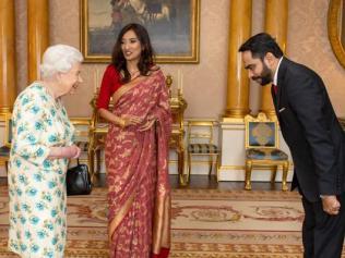 Britain's Queen Elizabeth meets the Sri Lankan High Commissioner Saroja Sirisena and her husband keeping her distance and without a handshake amid the global coronavirus outbreak. Picture: Getty 