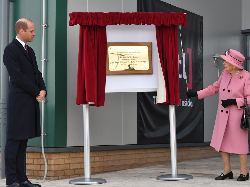 Prince William stands by as Queen Elizabeth unveils a plaque to officially open the new Energetics Analysis Centre at the Defence Science and Technology Laboratory near Salisbury, England. Picture: Ben Stansall/Getty Images