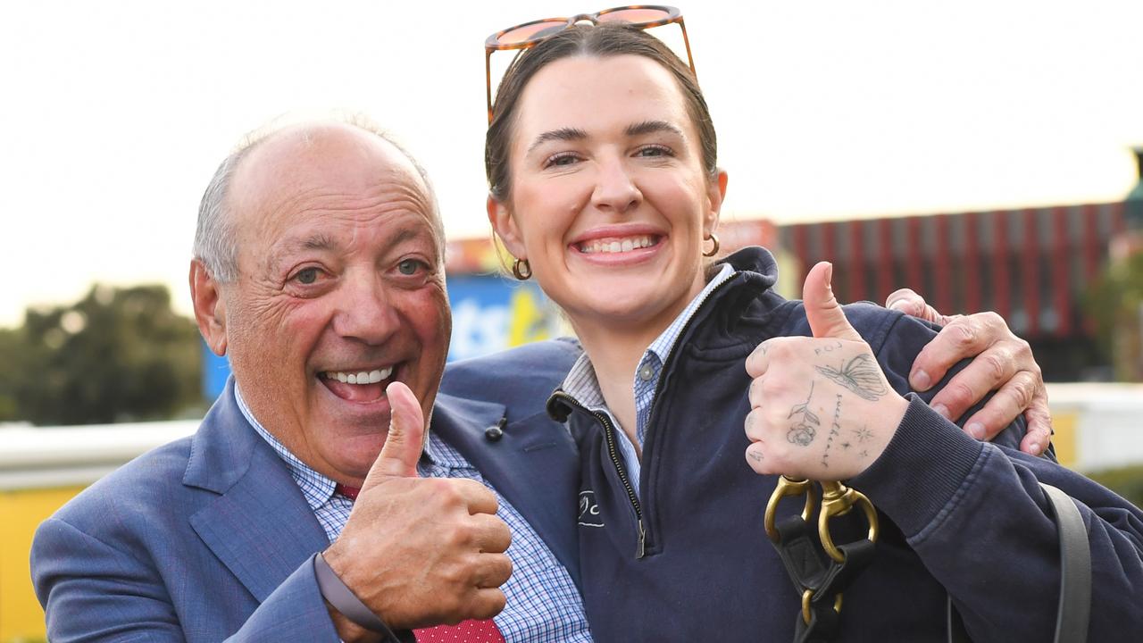 Tony Ottobre and strapper Sammie Waters are all smiles after Pride Of Jenni’s win. Picture: Vince Caligiuri/Getty Images