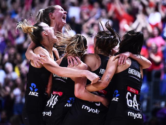 LIVERPOOL, ENGLAND - JULY 21: New Zealand players celebrate after winning the Vitality World Cup after the Vitality Netball World Cup Final match between Australia and New Zealand at M&S Bank Arena on July 21, 2019 in Liverpool, England. (Photo by Nathan Stirk/Getty Images)