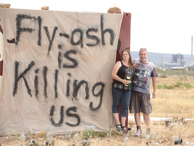 Kendall Jones and Trevor Robertson make their point clear on the ash from the Northern Power Station at Port Augusta. Picture: Tait Schmaal