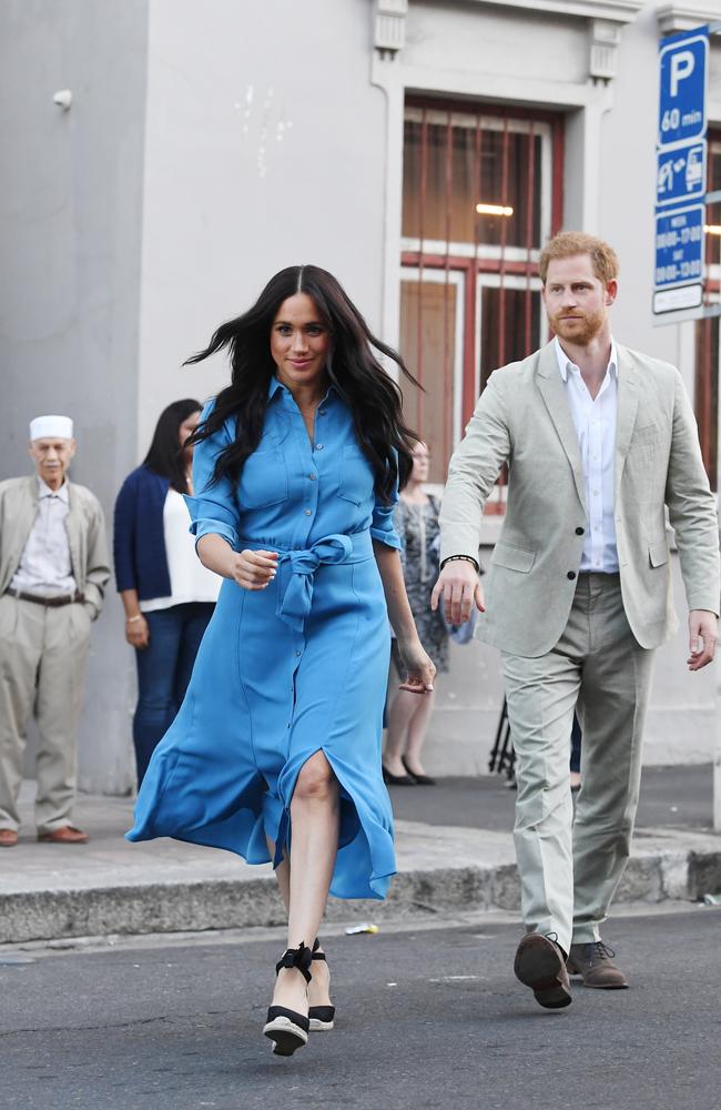 Meghan, Duchess of Sussex and Prince Harry, Duke of Sussex, leave after their visit to District Six Museum. Picture: Facundo Arrizabalaga — Pool/Getty Images