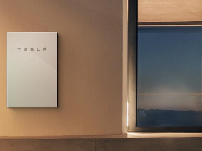 The Tesla Powerwall 2 battery stores electricity collected by solar panels.