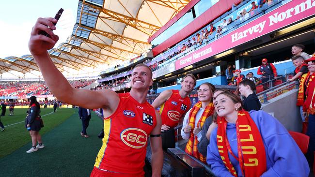 Jed Walter with fans after the Gold Coast Suns win over Port Adelaide Power at the People First Stadium on Sunday. Picture: Chris Hyde/Getty Images.