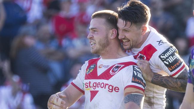 Euan Aitken celebrates one of his two tries with Gareth Widdop.