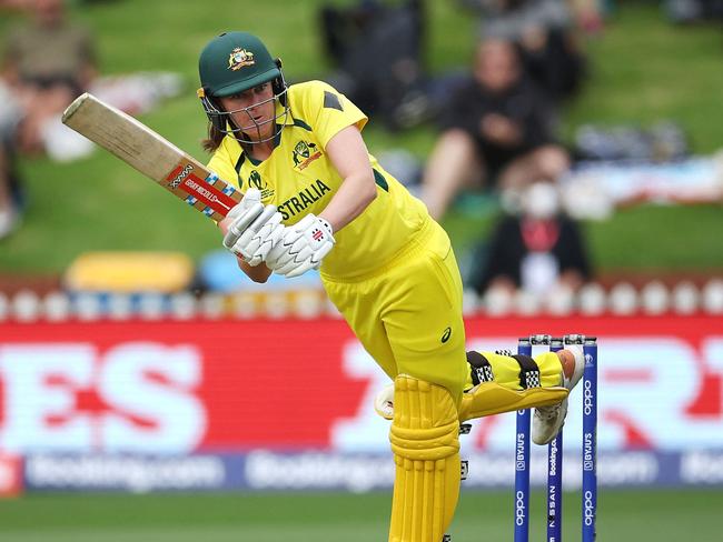 Australia's Tahlia McGrath bats during the 2022 Women's Cricket World Cup match between New Zealand and Australia at the Basin reserve in Wellington on March 13, 2022. (Photo by Marty MELVILLE / AFP)