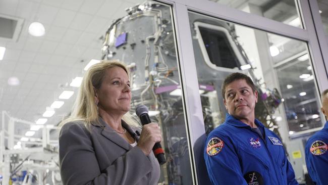 SpaceX President Gwynne Shotwell, left, credited with steering the company clear of the turmoil surrounding founder Elon Musk and Tesla Inc., stood near astronaut Bob Behnken at a NASA visit to SpaceX headquarters August.