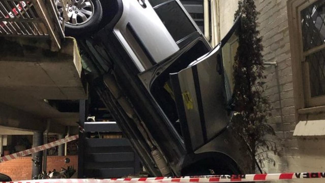 A man has escaped injury after his car went over the edge of a carpark in Melbourne. Picture: Fire Rescue Victoria, Twitter