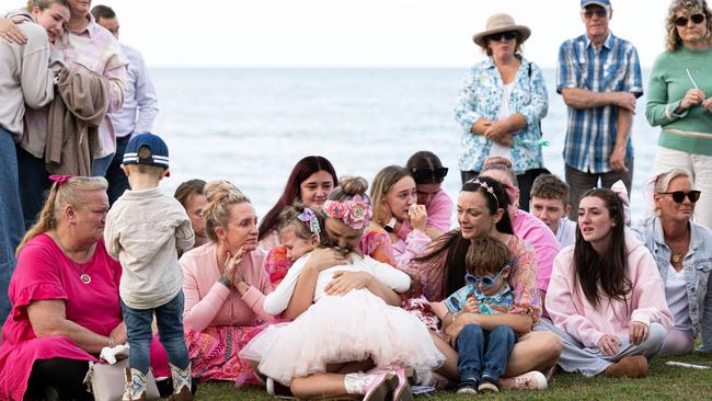 People gather to remember Sophia Rose. Libby French & Kristielle Burrage from Kids & co console each other. Photo Paul Beutel