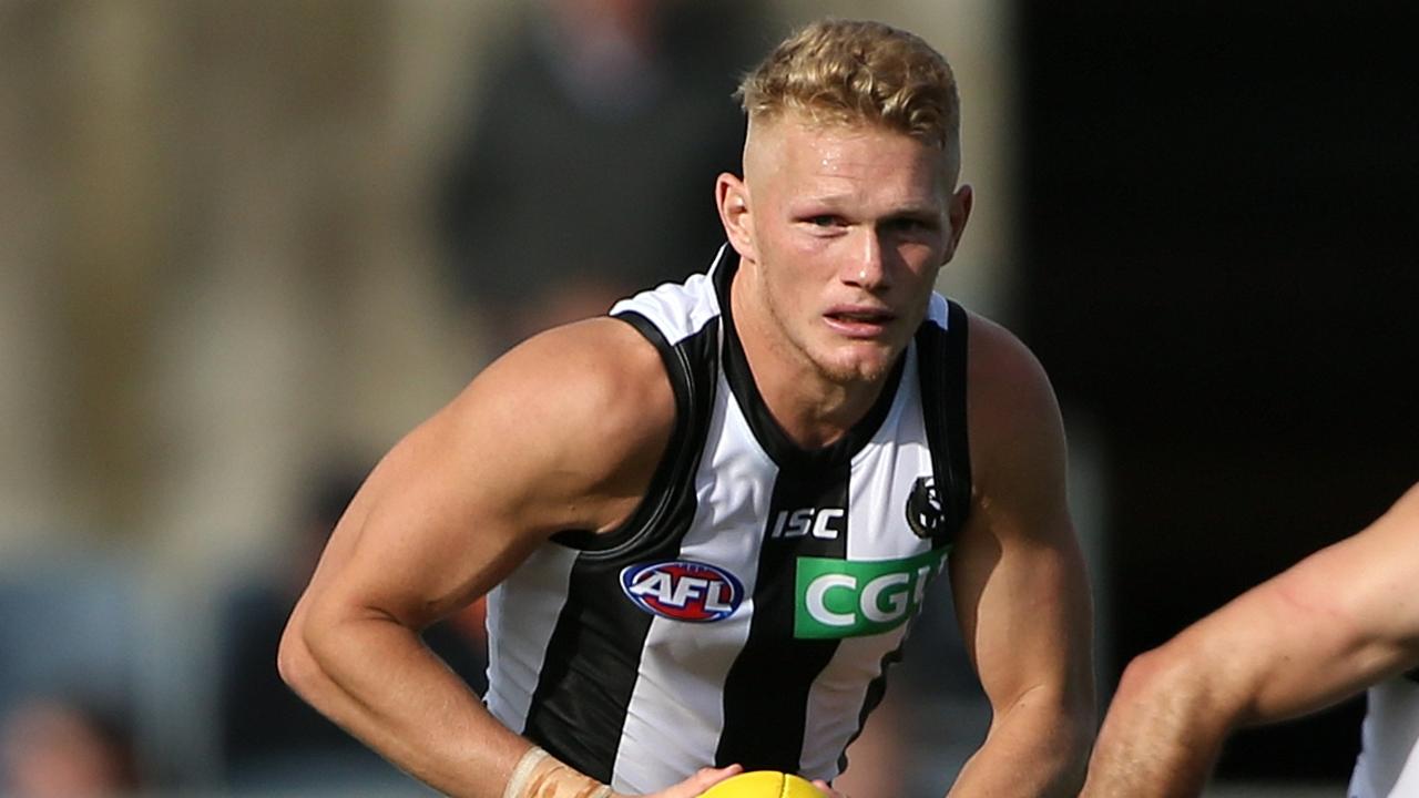 Adam Treloar suffered an injury on his first day back at training. (AAP Image/Sean Garnsworthy)