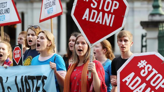 21-year-old Juliet Hope among Adani protesters outside Parliament House in Brisbane. Picture: Tara Croser.