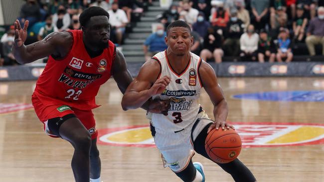 Scott Machado of the Cairns Taipans and Majok Majok of the Perth Wildcats during the NBL Blitz match between Perth Wildcats and Cairns Taipans. (Photo by Sarah Reed/Getty Images)