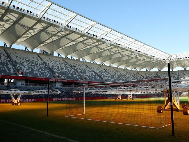 'Grow Lights' lighting rigs provide warmth and light to stimulate turf growth ahead of the Western Sydney Wanderers v Leeds United match on Saturday, July 20. Picture: Cameron Spencer/Getty Images