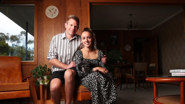 Lucy and Nathan Bosker with dog Max who recently bought a home in Kingston Beach. Picture: NIKKI DAVIS-JONES