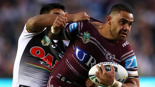 SYDNEY, AUSTRALIA — SEPTEMBER 02: Dylan Walker of the Sea Eagles is tackled during the round 26 NRL match between the Manly Sea Eagles and the Penrith Panthers at Lottoland on September 2, 2017 in Sydney, Australia. (Photo by Cameron Spencer/Getty Images)