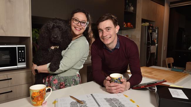 Jasmine and Ethan Crooks-Mosely, both 30, with their dog Echo, were able to buy their first home using government schemes to save more than $40,000. Picture: Nicki Connolly