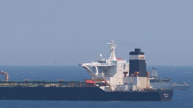 A British Royal Navy ship patrols near supertanker Grace 1 before commandos boarded the oil tanker. Picture: AFP.