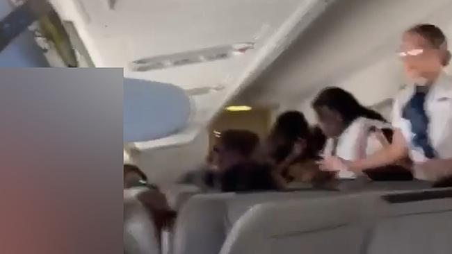 Australian Federal Police and NT Police arrested four passengers over an alleged brawl on a flight from Cairns to Darwin, via Groote Eylandt, on Thursday April 20.