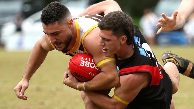 NFL: Thomastown’s Marcus Arico is taken down. Picture: Hamish Blair