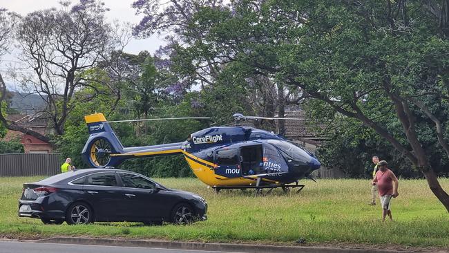 The CareFlight helicopter also landed nearby at Emu Plains. Picture: Kelly Robinson