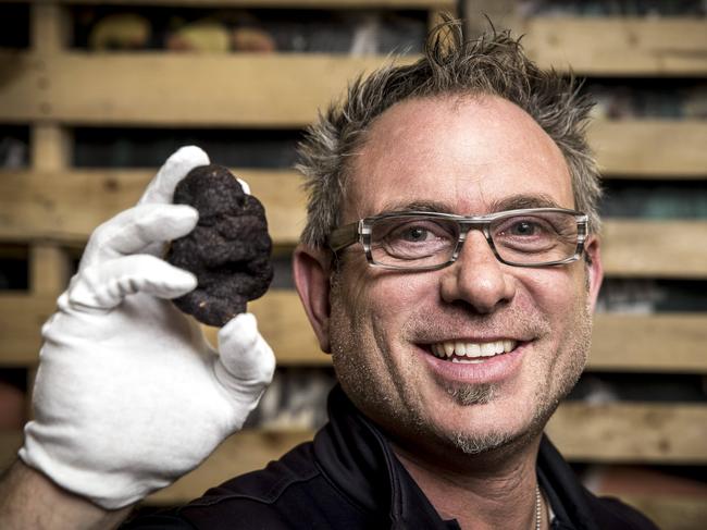 Mushroom Man Marco Marinelli with a Black Winter Truffle. Picture: Mike Burton