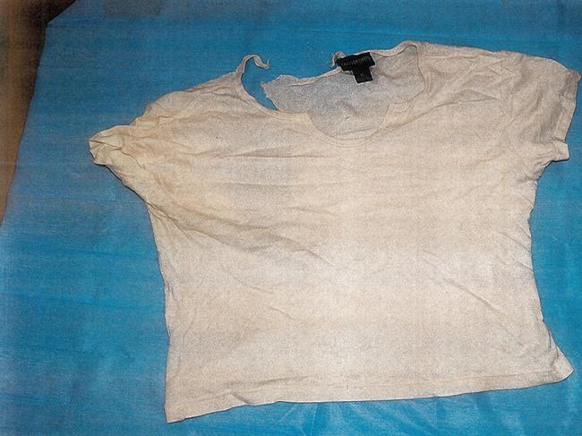 The yellow shirt worn by Isabela Carolina Camelo-Gomez on the night of her mother's murder, in November 2001. Picture: Supreme Court