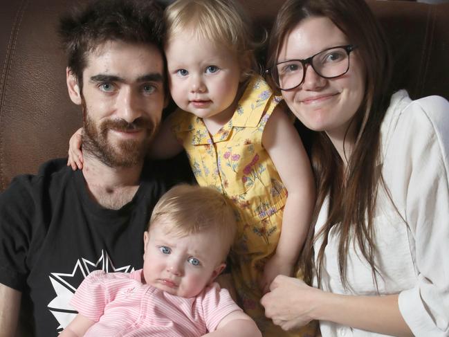 Christmas will be extra special this year for Ben Pink, his partner Sarah, and their two daughters, Daisy,2, and Dahliah,10 months. In October Ben became critically ill from the flu and subsequent bacterial pneumonia which led to lung failure. He spent over 6 weeks in a coma and was very lucky to survive. 23 December 2023. Picture Dean Martin