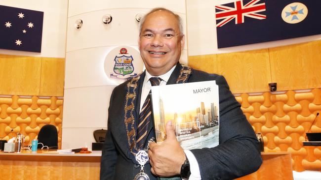 Mayor Tom Tate with the budget books in the chamber. Picture Glenn Hampson