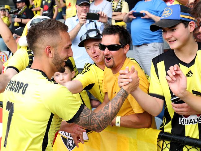 BALLARAT, AUSTRALIA - DECEMBER 28: Reno Piscopo of the Wellington Phoenix celebrates their win with fans during the round 12 A-League match between Western United and Wellington Phoenix at Mars Stadium on December 28, 2019 in Ballarat, Australia. (Photo by Jonathan DiMaggio/Getty Images)