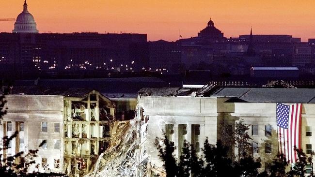 The damaged area of the Pentagon building, where a commercial jetliner slammed into it September 11, is seen in the early morning at sunrise. Picture: AFP