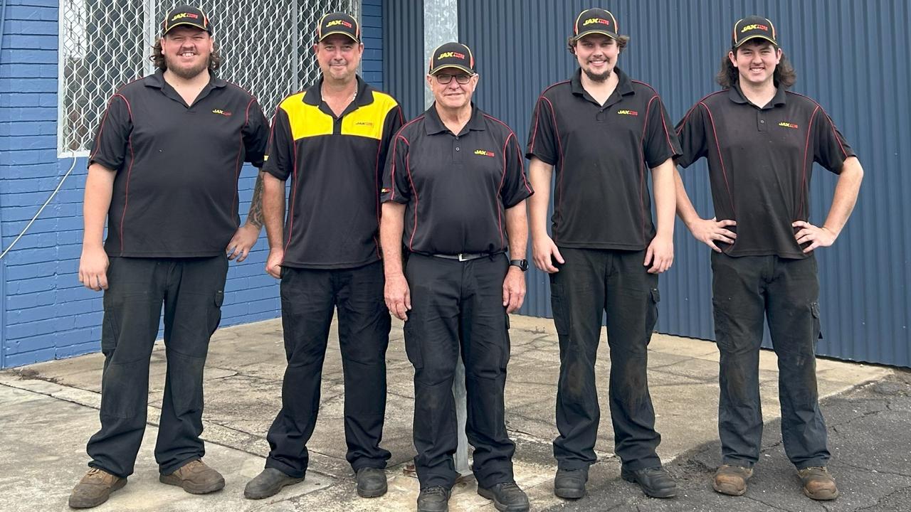 Franchisee Jeff Nicholls (centre) and the JAX Tyres & Auto Lismore team at the expansion launch in North Lismore on Saturday.