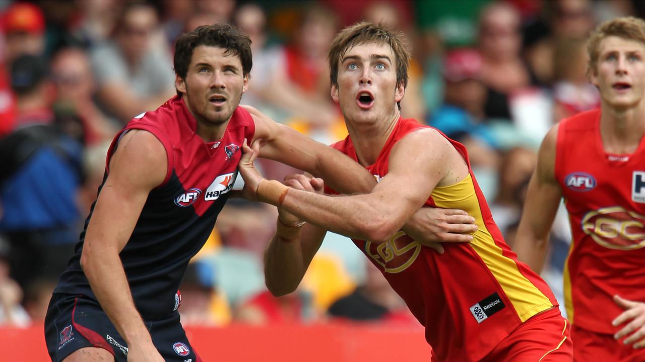 Charlie Dixon (right) during Gold Coast’s debut season in 2011.