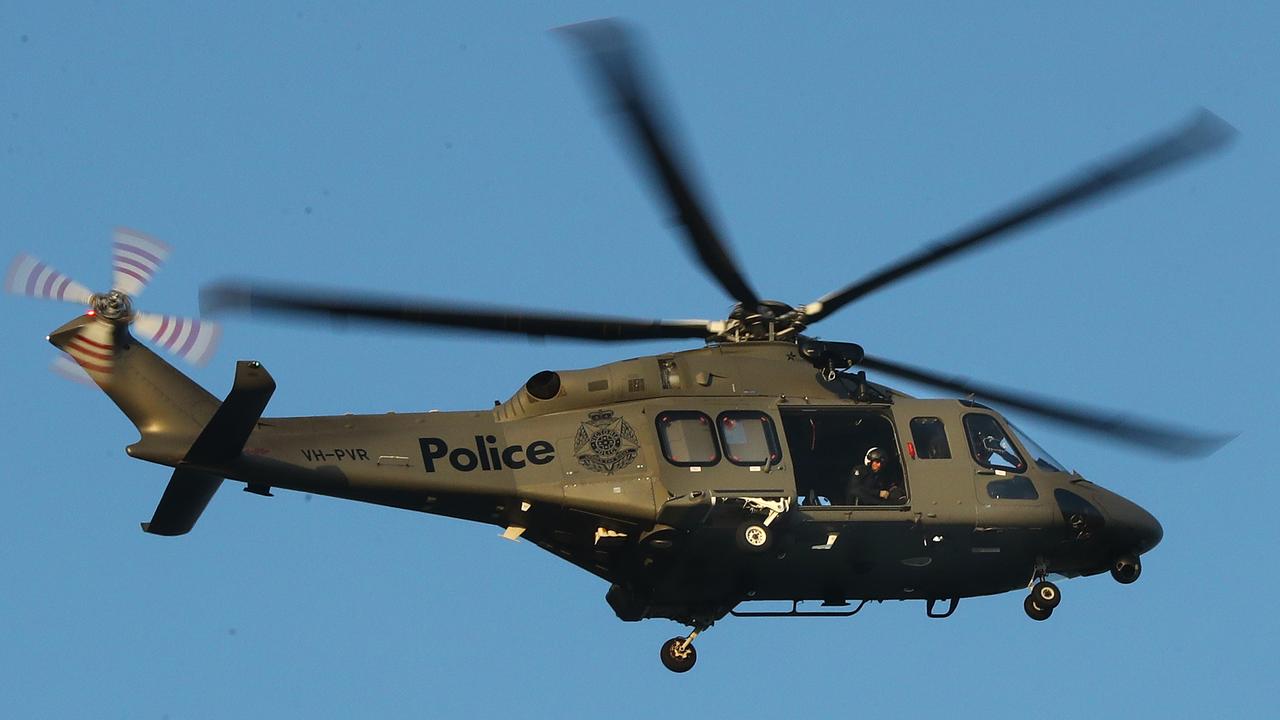 Man faces court after police pilots injured by laser pointer