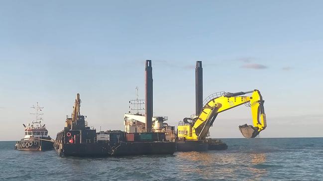 Backhoe dredge Woomera and support vessels in action in Cleveland Bay. Picture: Port of Townsville.