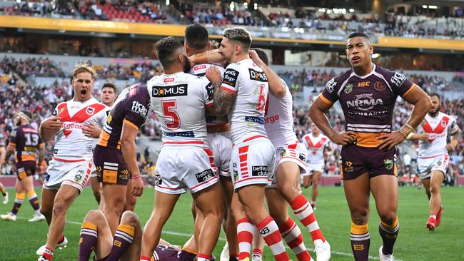 A dejected Jamayne Isaako following a Dragons try. (AAP Image/Darren England)