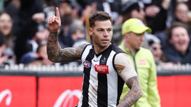 Jamie Elliott celebrates a goal for the Pies. Picture: Michael Klein