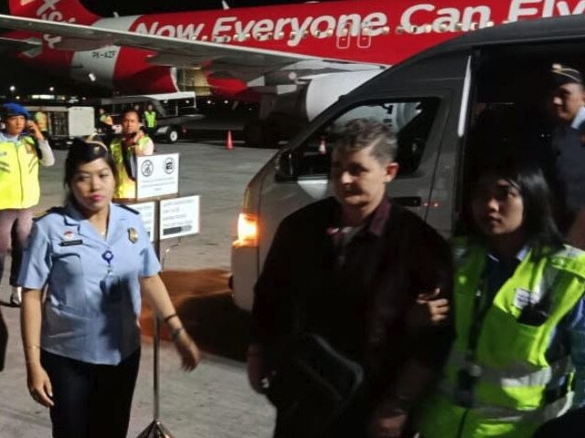 Lawrence boarding her plane to Brisbane.