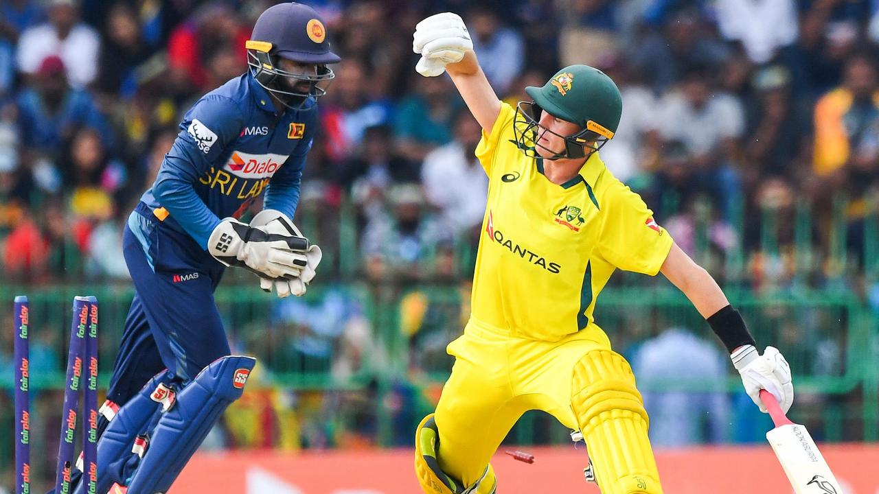 Australia's Marnus Labuschagne (R) is dismissed by Sri Lanka's Niroshan Dickwella (L) during the third one-day international (ODI) cricket match between Sri Lanka and Australia at R. Premadasa International Cricket Stadium in Colombo on June 19, 2022. (Photo by ISHARA S. KODIKARA / AFP)